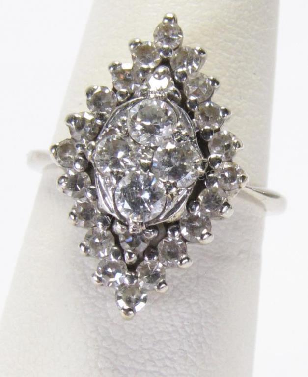 Appraisal: An antique K white gold marquis shaped cluster ring with