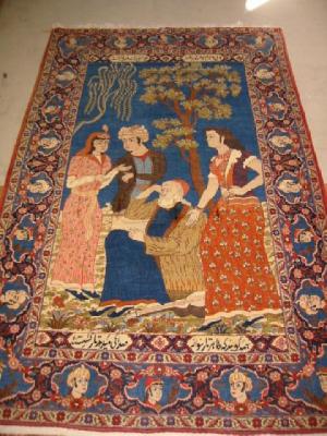 Appraisal: A KASHAN PICTORIAL RUG the blue field depicting figures in