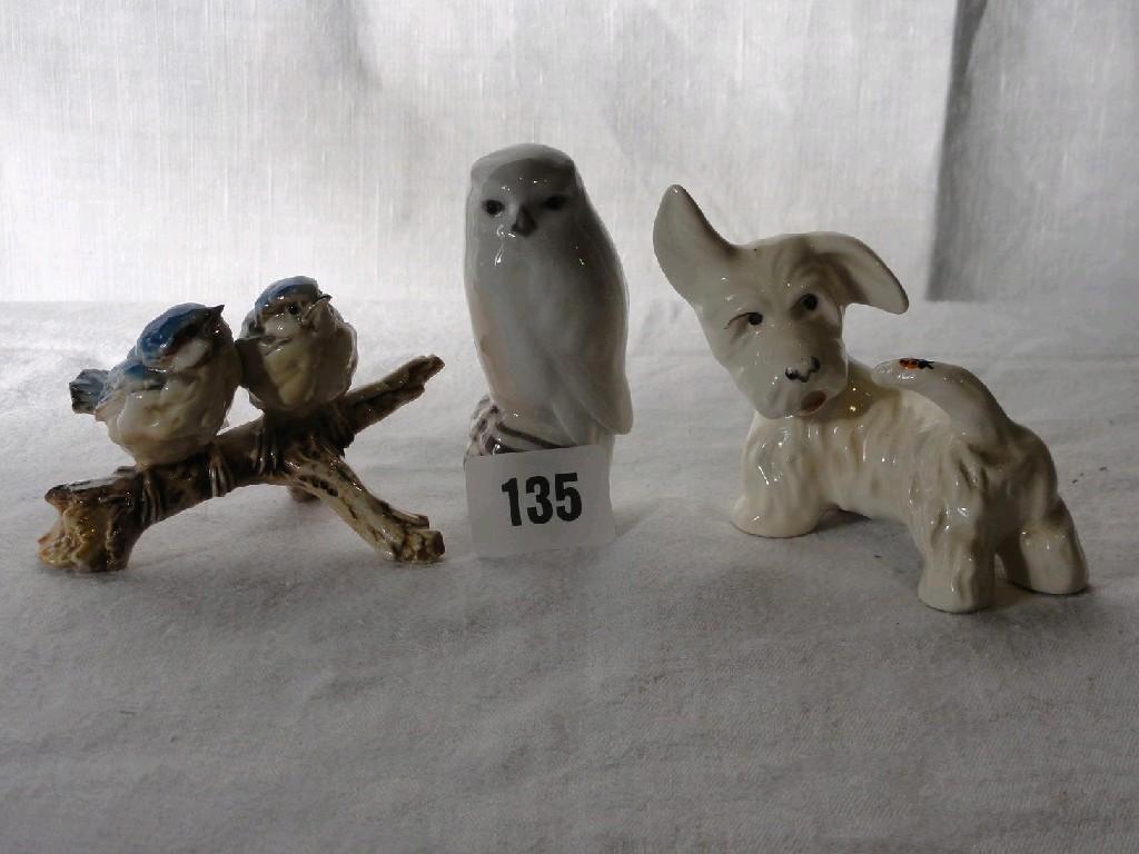 Appraisal: A Royal Copenhagen model of an owl a Beswick model