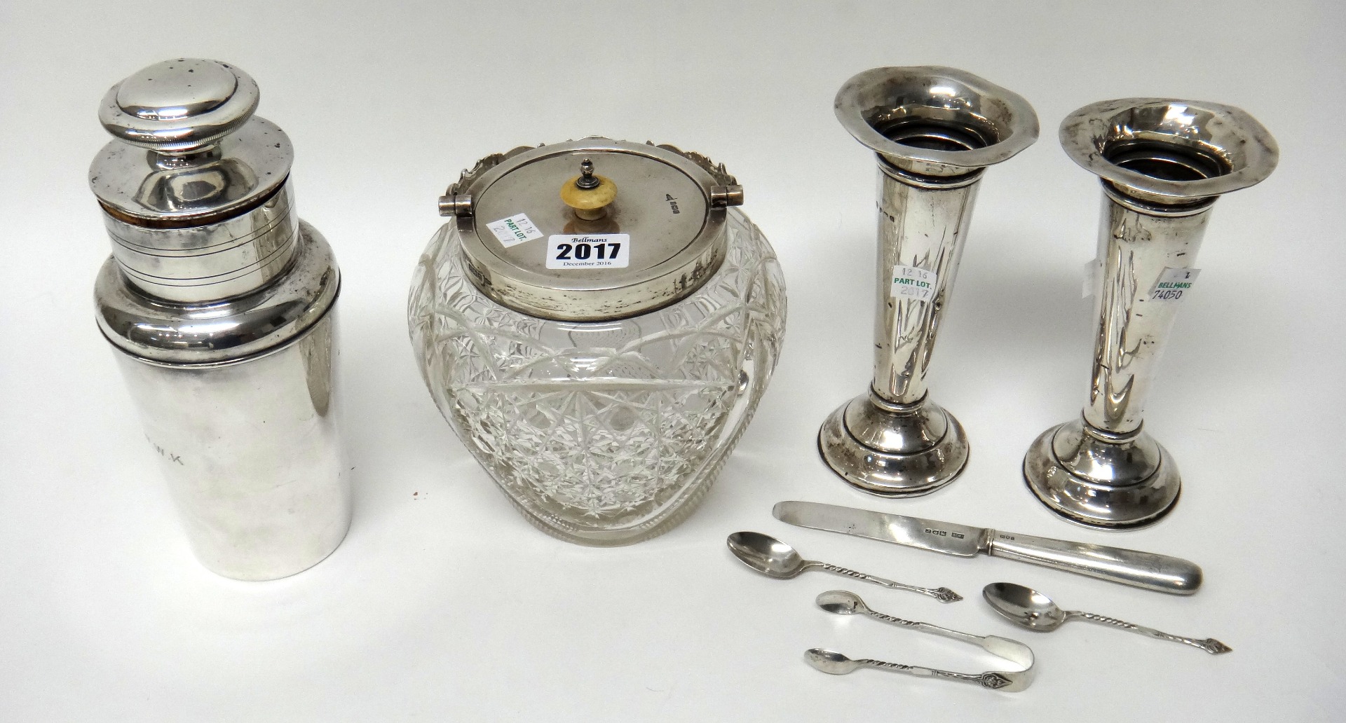 Appraisal: A silver mounted faceted glass biscuit barrel Sheffield a pair