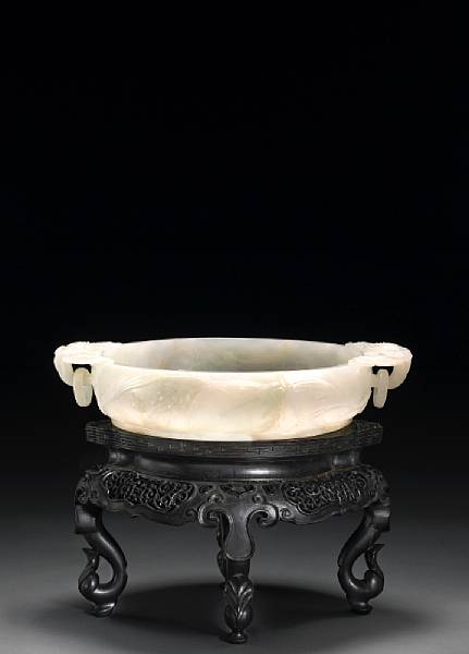 Appraisal: A white jade marriage bowl th th Century Of compressed