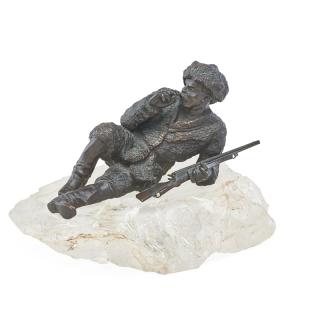 Appraisal: RUSSIAN COSSACK BRONZE SCULPTURE Soldier in a reclined position with