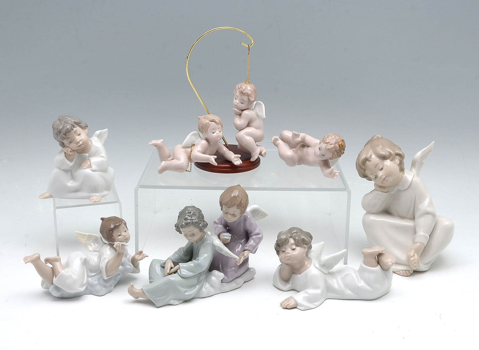 Appraisal: LLADRO ANGELS FIGURES ''Making A Wish'' ''Angel Care'' ''Angel Laying