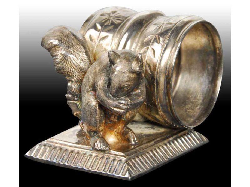 Appraisal: Seated Squirrel with Nut Figural Napkin Ring Description Marked Southington