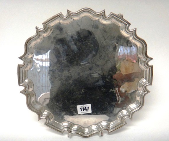 Appraisal: A silver salver of shaped circular form in the Chippendale