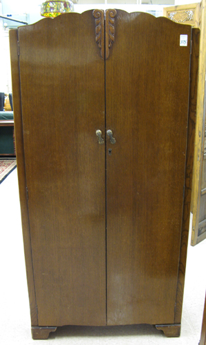 Appraisal: AN OAK DOUBLE-DOOR WARDROBE English mid th century having two