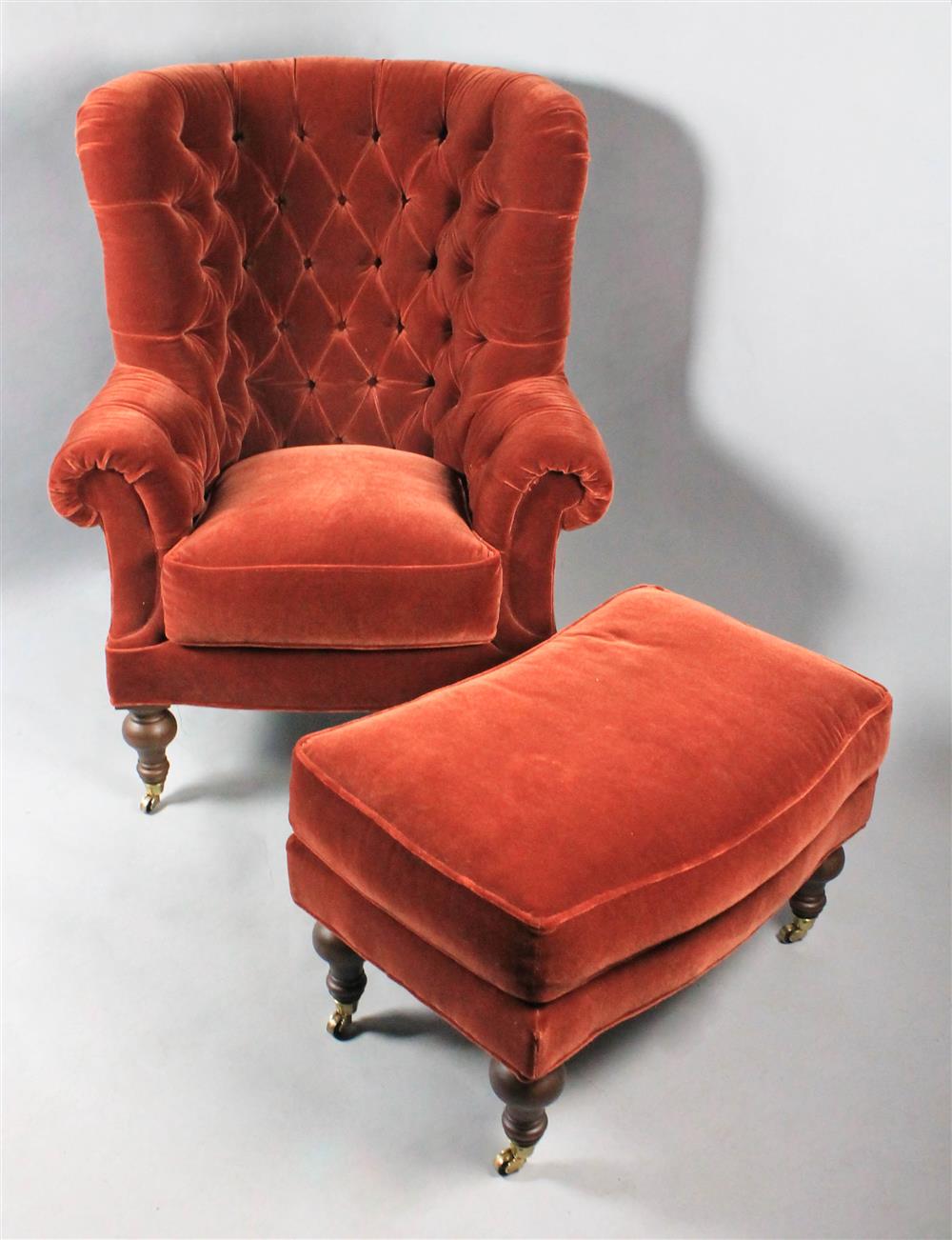 Appraisal: LILLIAN AUGUST MOHAIR VELVET TUFTED OVERSIZED WING CHAIR AND OTTOMAN