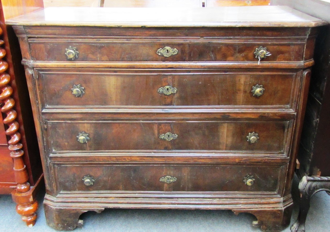 Appraisal: An early th century Italian walnut commode of four long