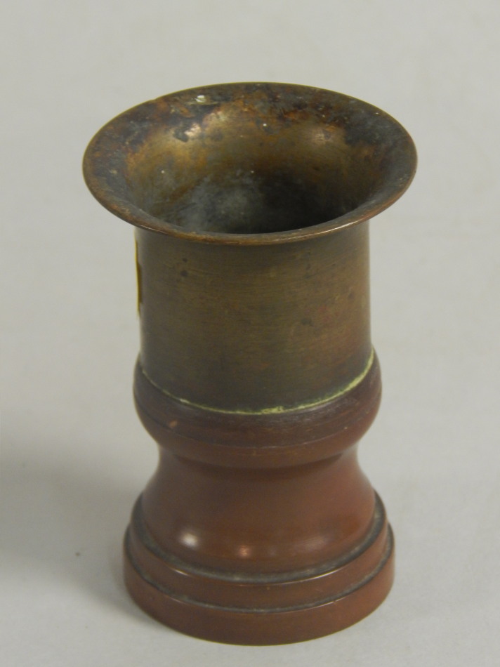 Appraisal: An unusual late thC thC turned wooden and brass cup