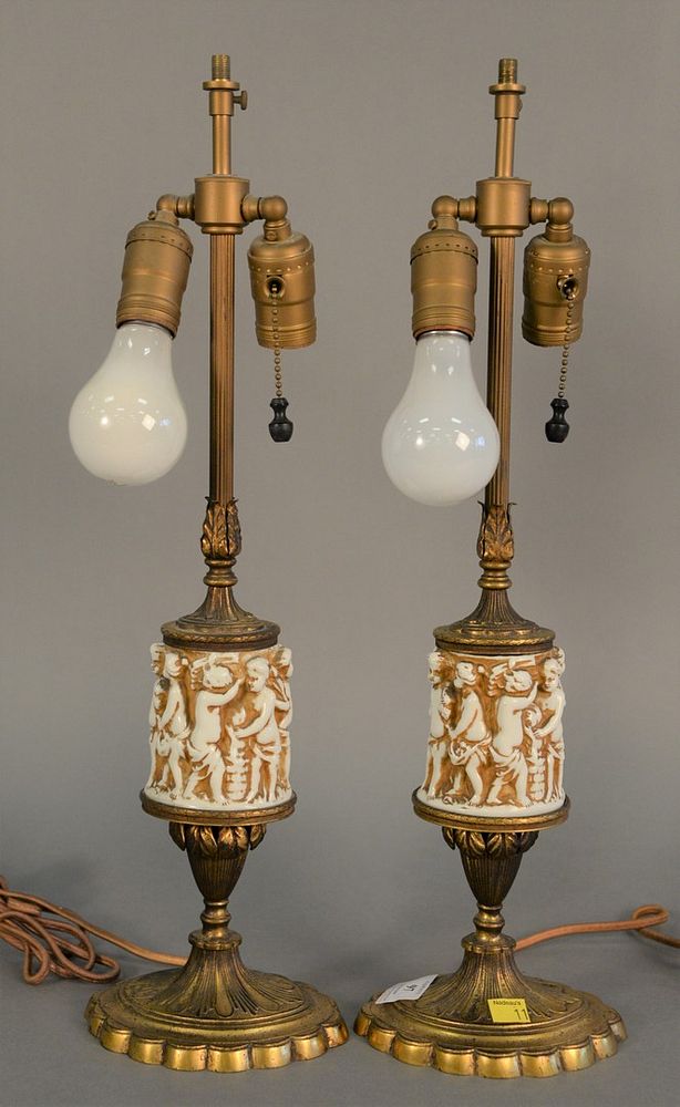 Appraisal: Pair of French table lamps having sleeve with moulded porcelain