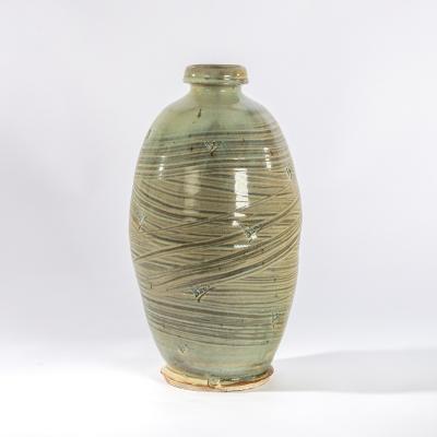 Appraisal: Mike Dodd British born a large celadon glaze bottle vase