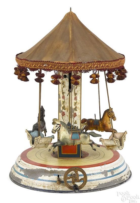 Appraisal: Marklin painted tin clockwork musical carousel Scarce Marklin painted tin