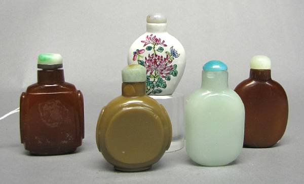 Appraisal: A group of five snuff bottles Including one of carnelian