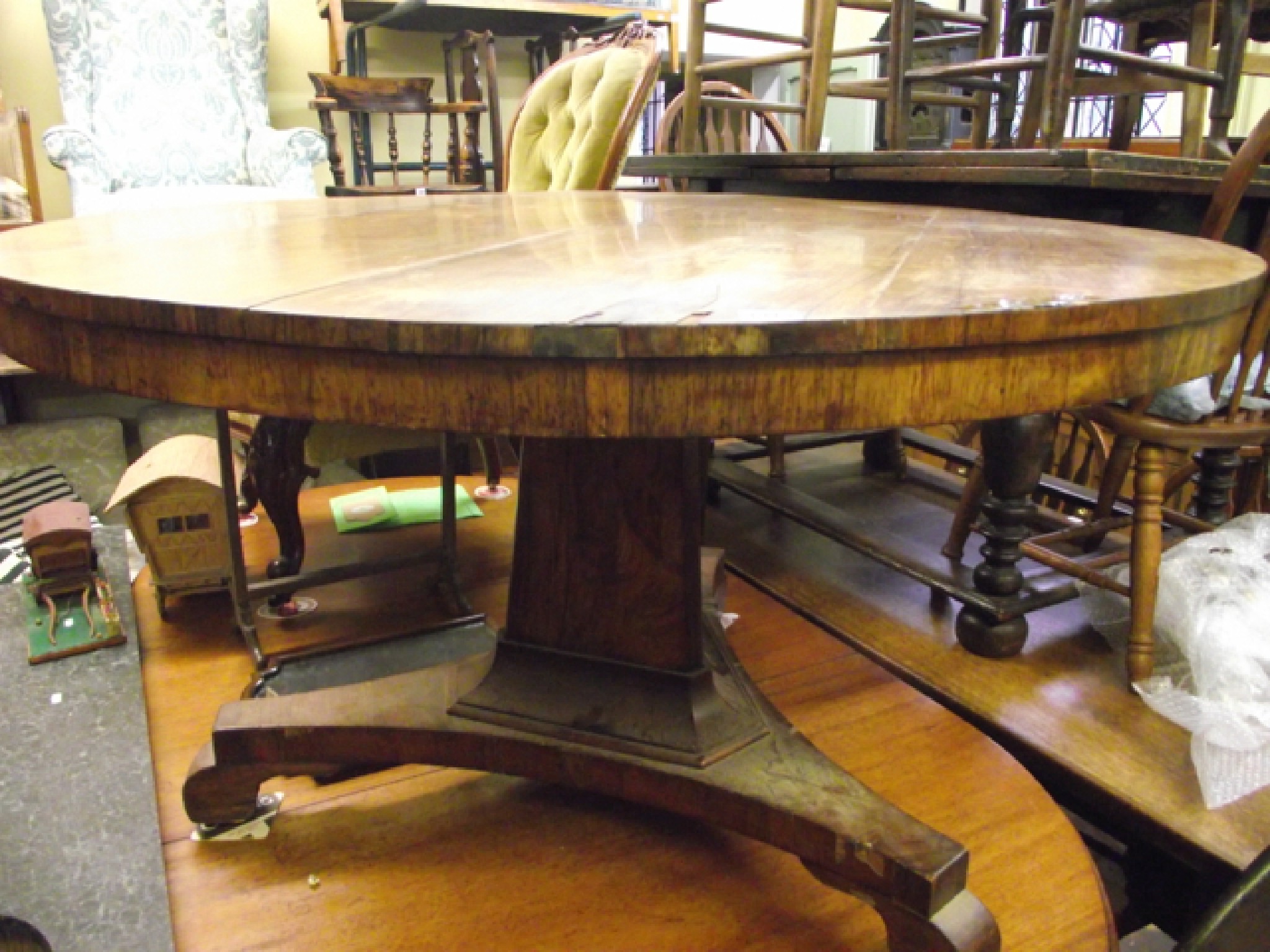 Appraisal: A mid th century rosewood tea table the circular top