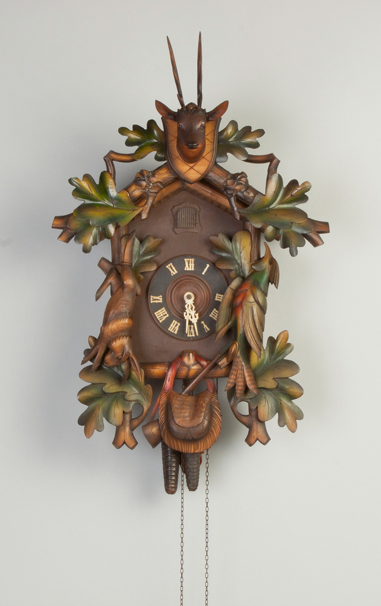 Appraisal: German Cuckoo Clock Carved deer head rabbit bird