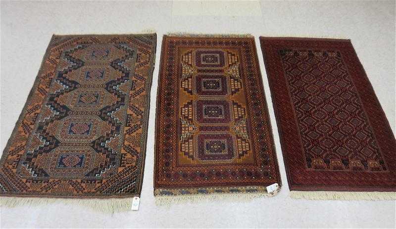 Appraisal: THREE AFGHANI TURKOMAN AREA RUGS all hand knotted sizes '