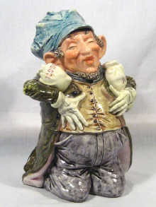 Appraisal: Judaica A fine porcelain figure of a Jewish merchant opening