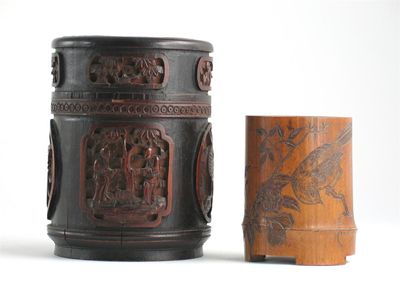 Appraisal: A bamboo cylindrical box and cover carved with panels of