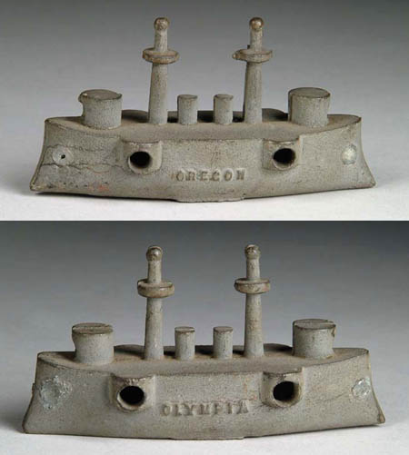 Appraisal: PAIR OF FIRECRACKER BATTLESHIPS PROBABLY BY GREY IRON Highly unusual