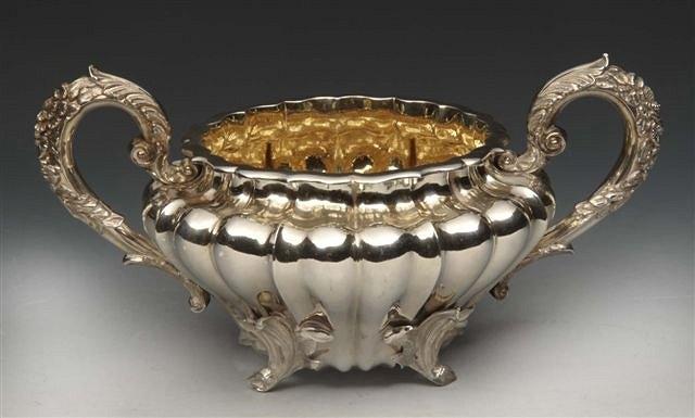 Appraisal: A WILLIAM IV SILVER SUGAR BOWL with gourd shaped sides