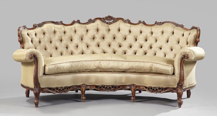 Appraisal: Louis XV-Inspired Crescent-Form Sofa early th century the serpentine carved