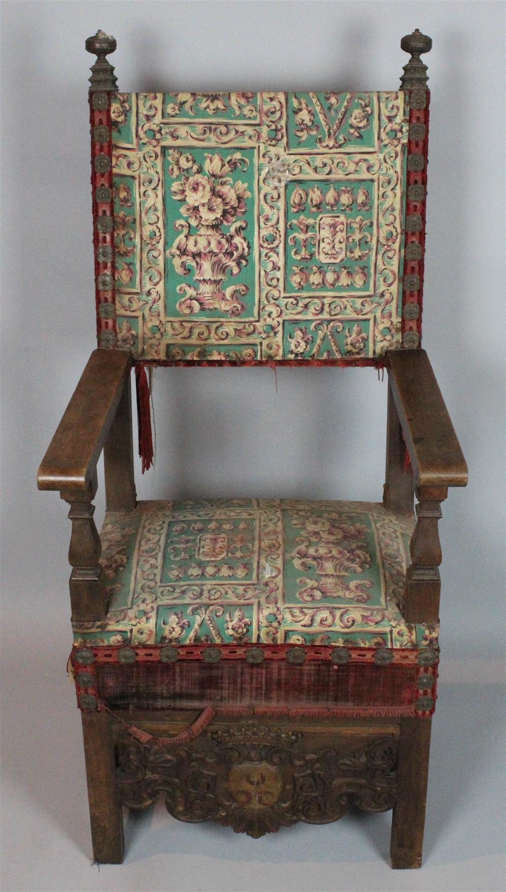 Appraisal: JACOBEAN STYLE CARVED WALNUT THRONE CHAIR having metal finials over