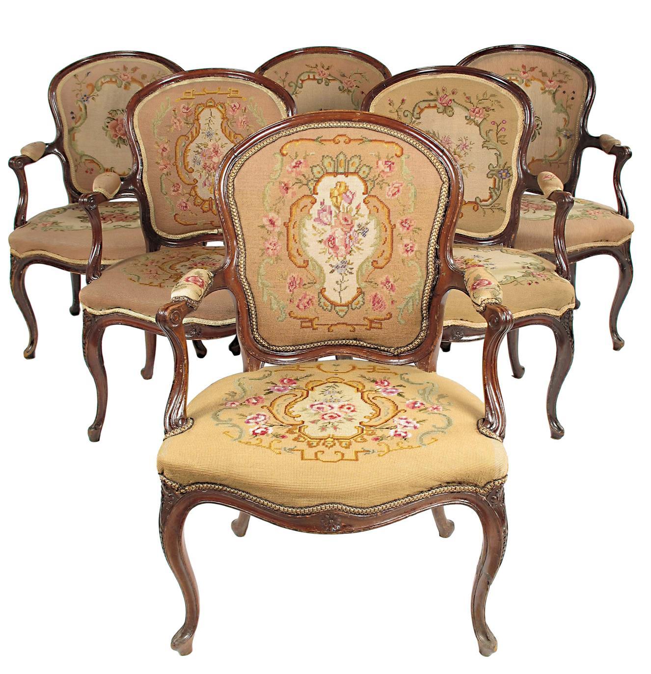 Appraisal: A set of six George III mahogany open armchairs in