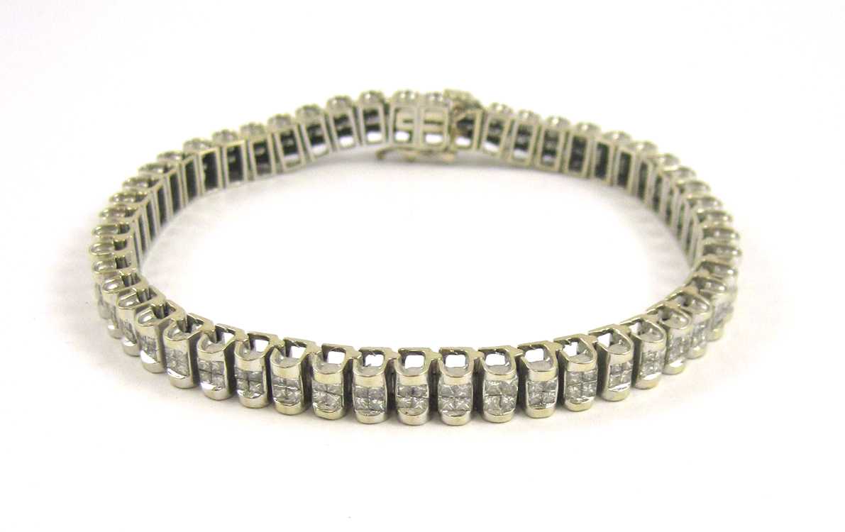 Appraisal: DIAMOND AND FOURTEEN KARAT WHITE GOLD BRACELET measuring inches in