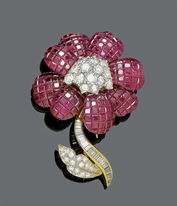 Appraisal: RUBY AND DIAMOND BROOCH Yellow and white gold Decorative elegant