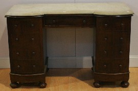 Appraisal: A Victorian style marble-topped stained pine desk cm wide cm