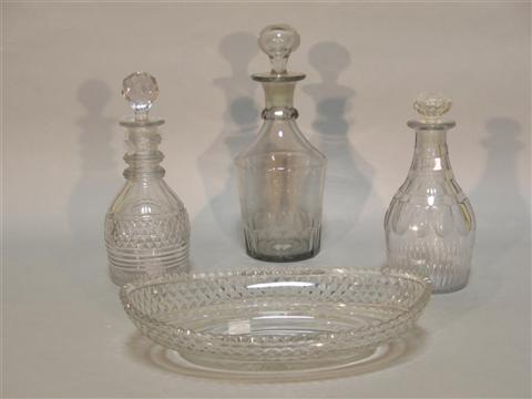 Appraisal: THREE CUT GLASS DECANTERS AND A DISH Late th early