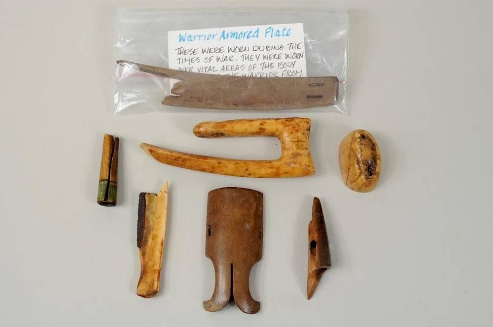 Appraisal: Group of Inuit Carved Fossilized Hunting Tools Group of Inuit