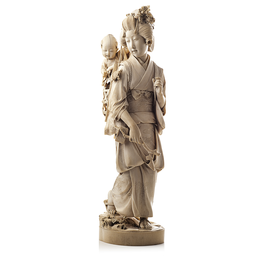 Appraisal: YFINE AND LARGE JAPANESE CARVED IVORY OKIMONO OF A MOTHER