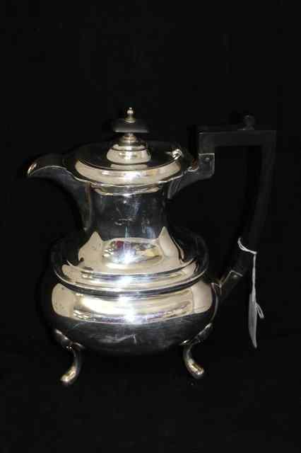 Appraisal: A SILVER COFFEE POT with ebonised handle approx grams overall