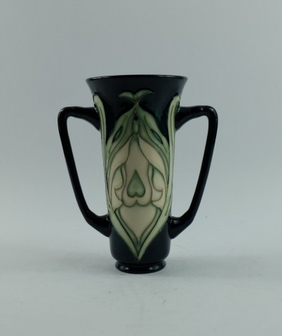 Appraisal: Moorcroft two handled vase decorated in the art nouveau design