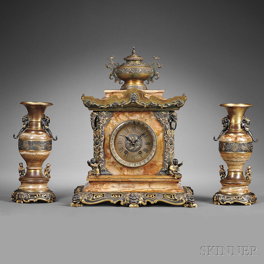 Appraisal: French Bronze and Marble Oriental Clock Garniture Set c the