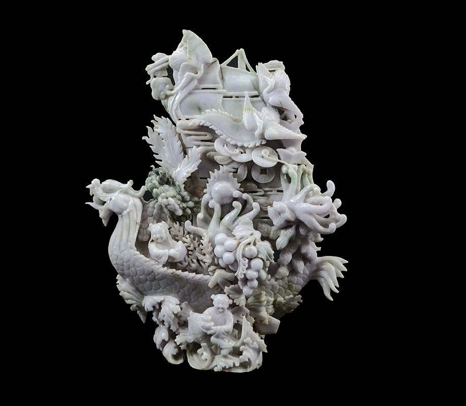 Appraisal: CHINESE CARVED JADEITE DRAGON BOAT Carved lavender and apple green