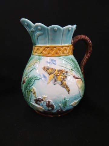 Appraisal: Majolica Pottery Pitcher heron and florals a fine example