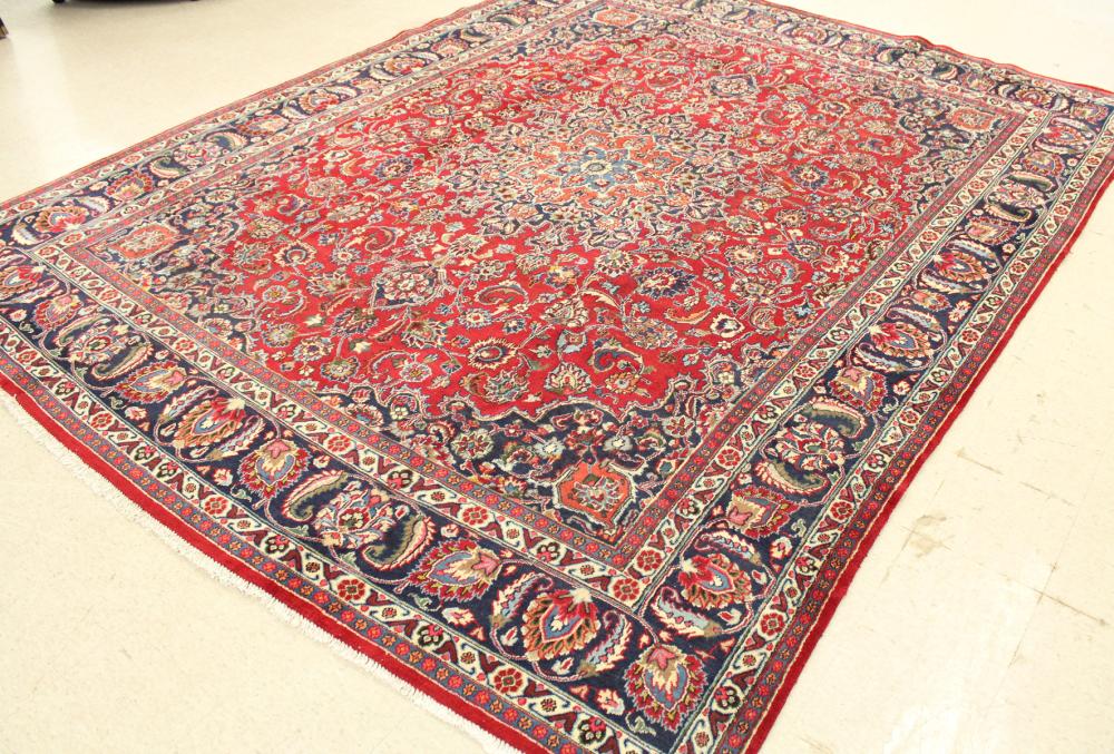 Appraisal: HAND KNOTTED PERSIAN MASHAD CARPET Khorasan Province northeastern Iran floral