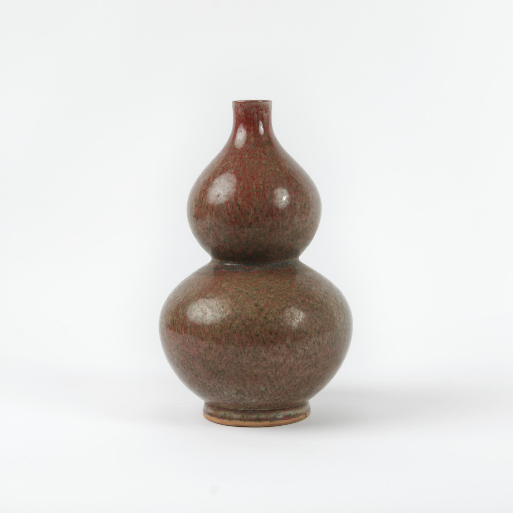 Appraisal: CHINESE PEACH BLOOM GLAZED DOUBLE GOURD VASE A Chinese double