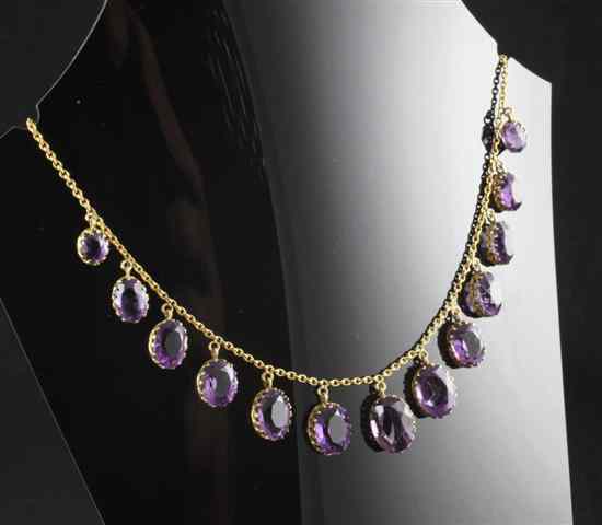 Appraisal: An Edwardian ct gold and amethyst fringe necklace set with