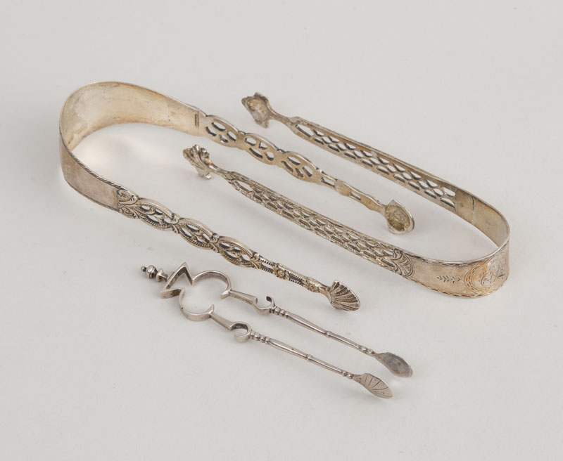 Appraisal: PAIR OF AMERICAN SILVER SCISSOR-FORM SUGAR NIPS AND TWO AMERICAN