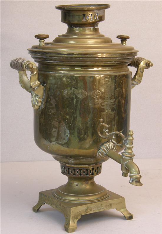 Appraisal: th century brass Russian samovar the front engraved raised on