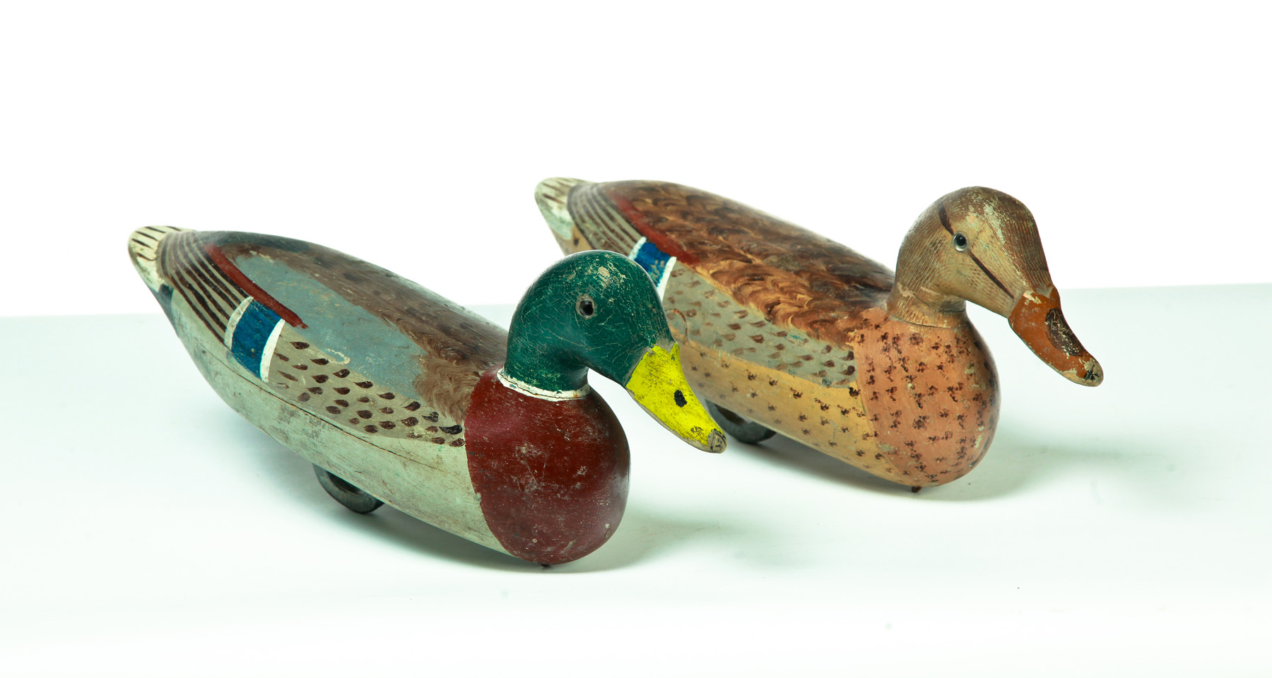 Appraisal: PAIR OF AMERICAN DUCK DECOYS Made by Walter Tube Dawson