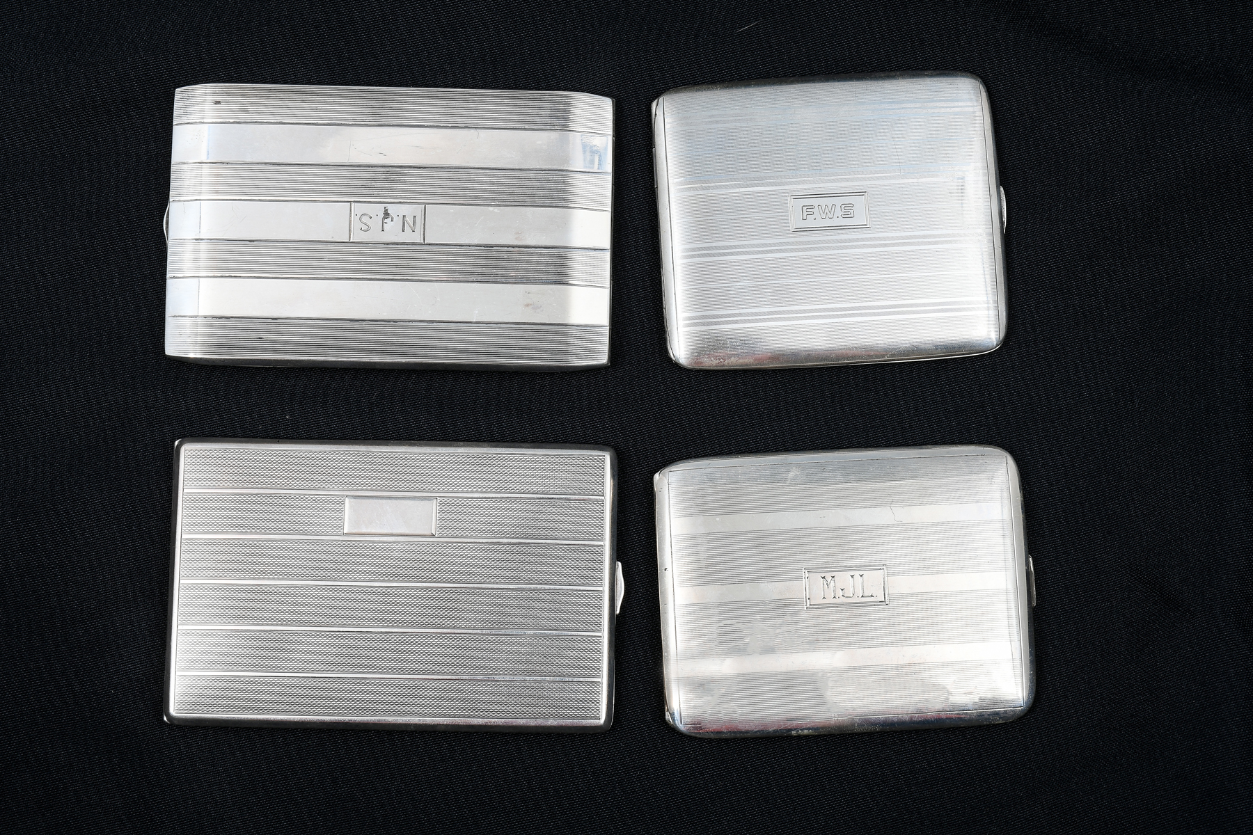 Appraisal: ART DECO STERLING CIGARETTE CASES Comprising - La Pierre Mfg