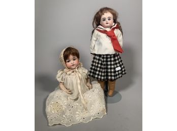 Appraisal: Two antique bisque head dolls Armand Marseille with static eyes