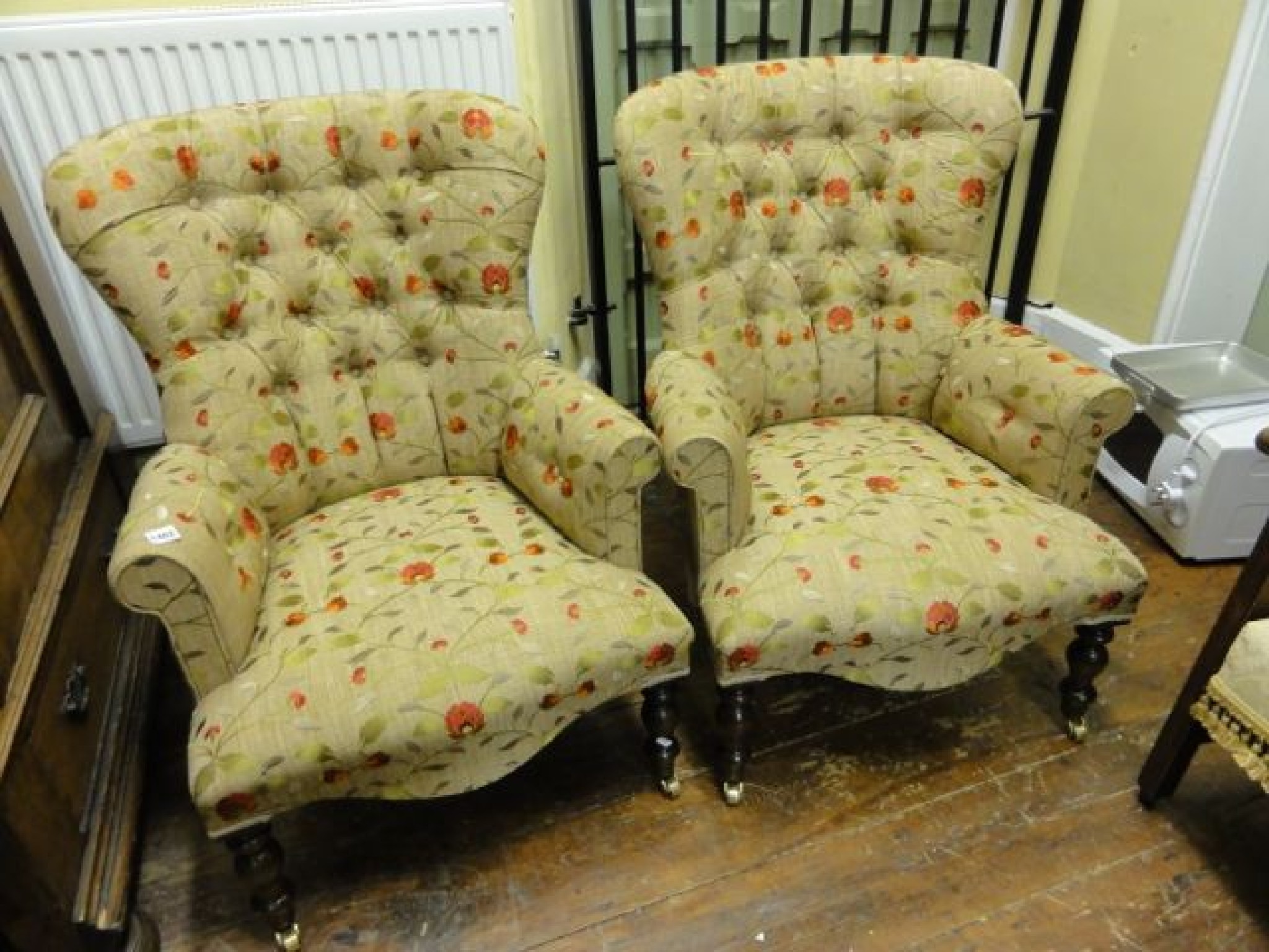 Appraisal: A pair of Victorian style spoon back drawing room chairs