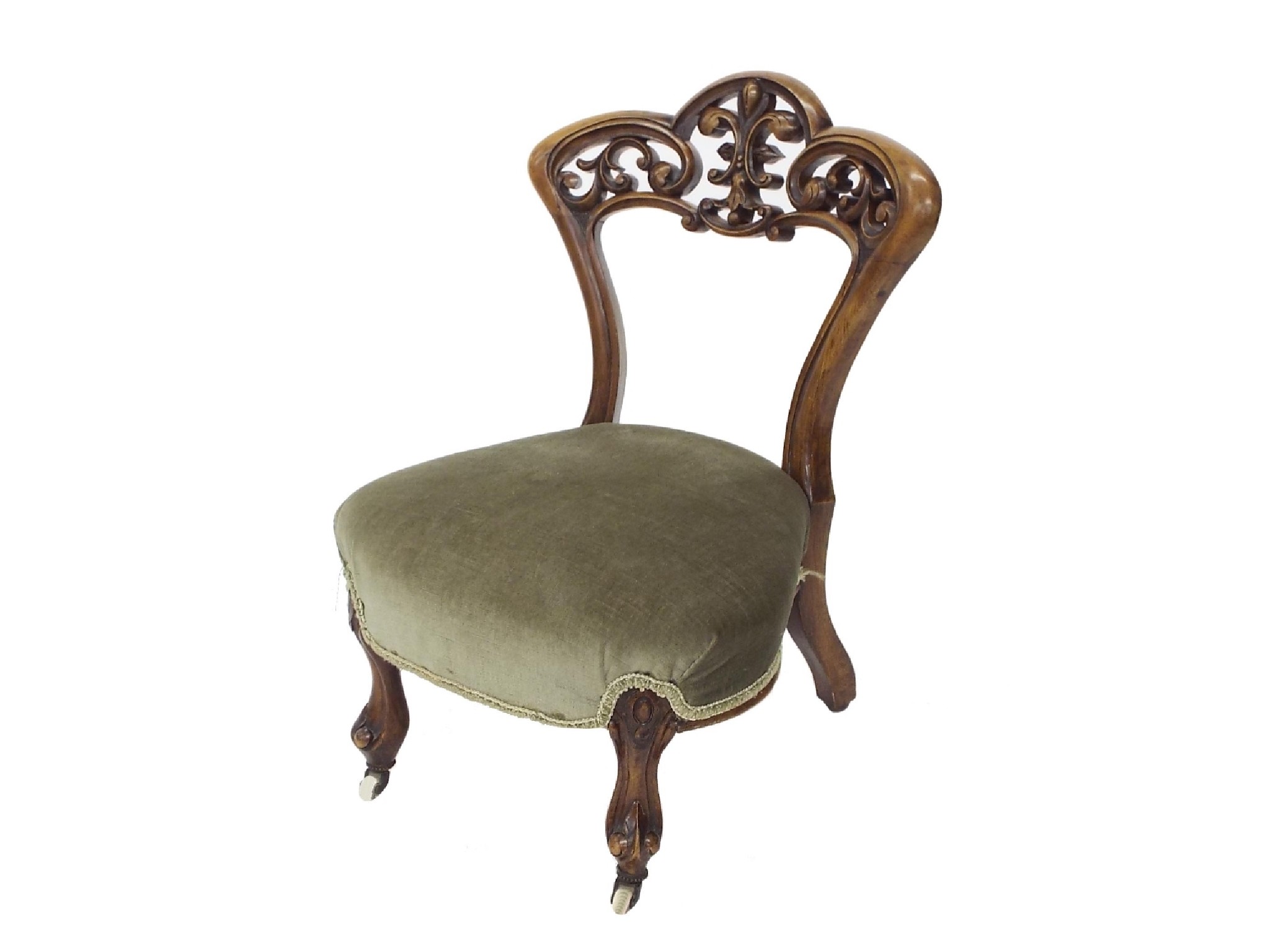 Appraisal: Late Victorian balloon back nursing chair the mahogany frame carved