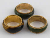 Appraisal: A yellow metal tests carat gold nephrite band ring size