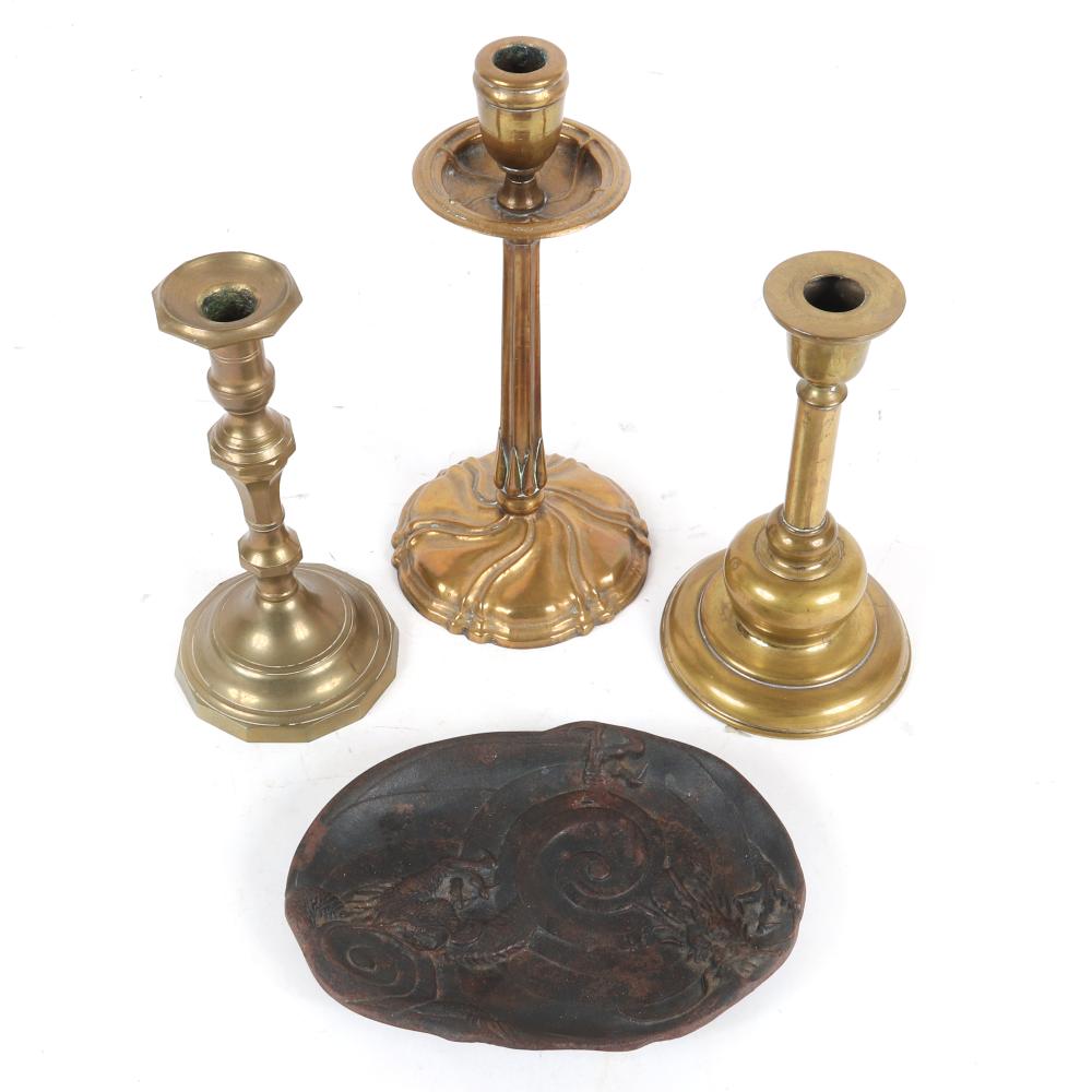 Appraisal: FOUR ANTIQUE BRASS CANDLESTICKS ONE HAND TOOLED WITH ART NOUVEAU